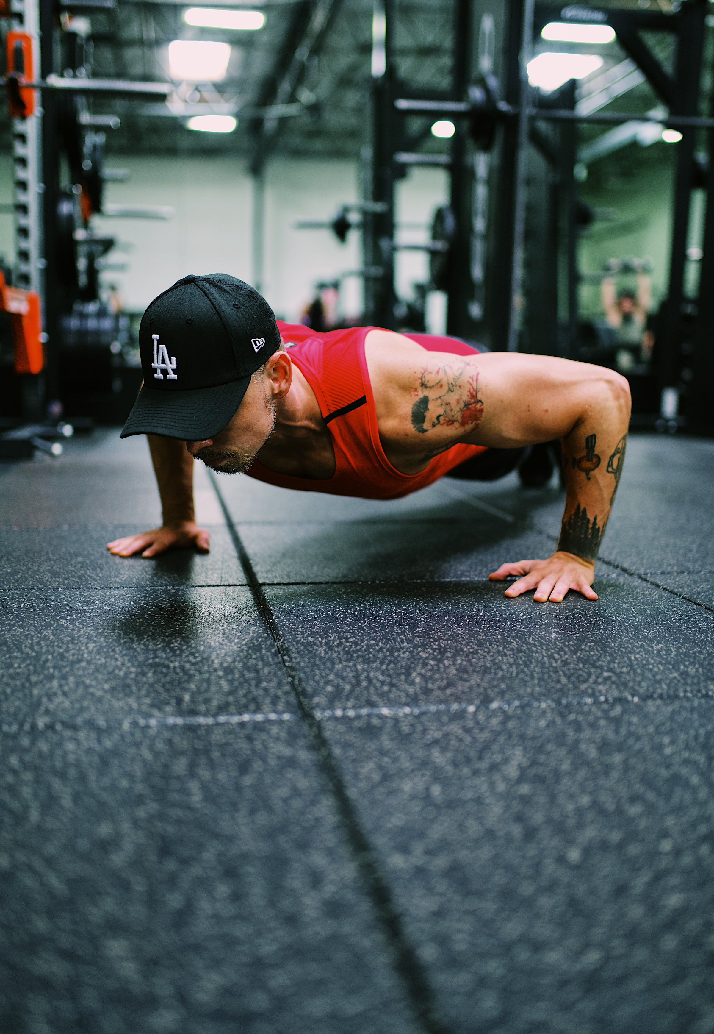 men doing pushups in a fitness club