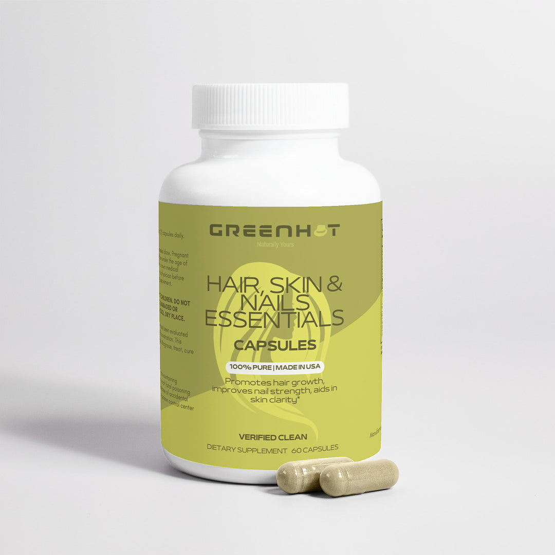A bottle of GreenHat Hair, Skin and Nails Essentials supplements with capsules in front on a plain background.