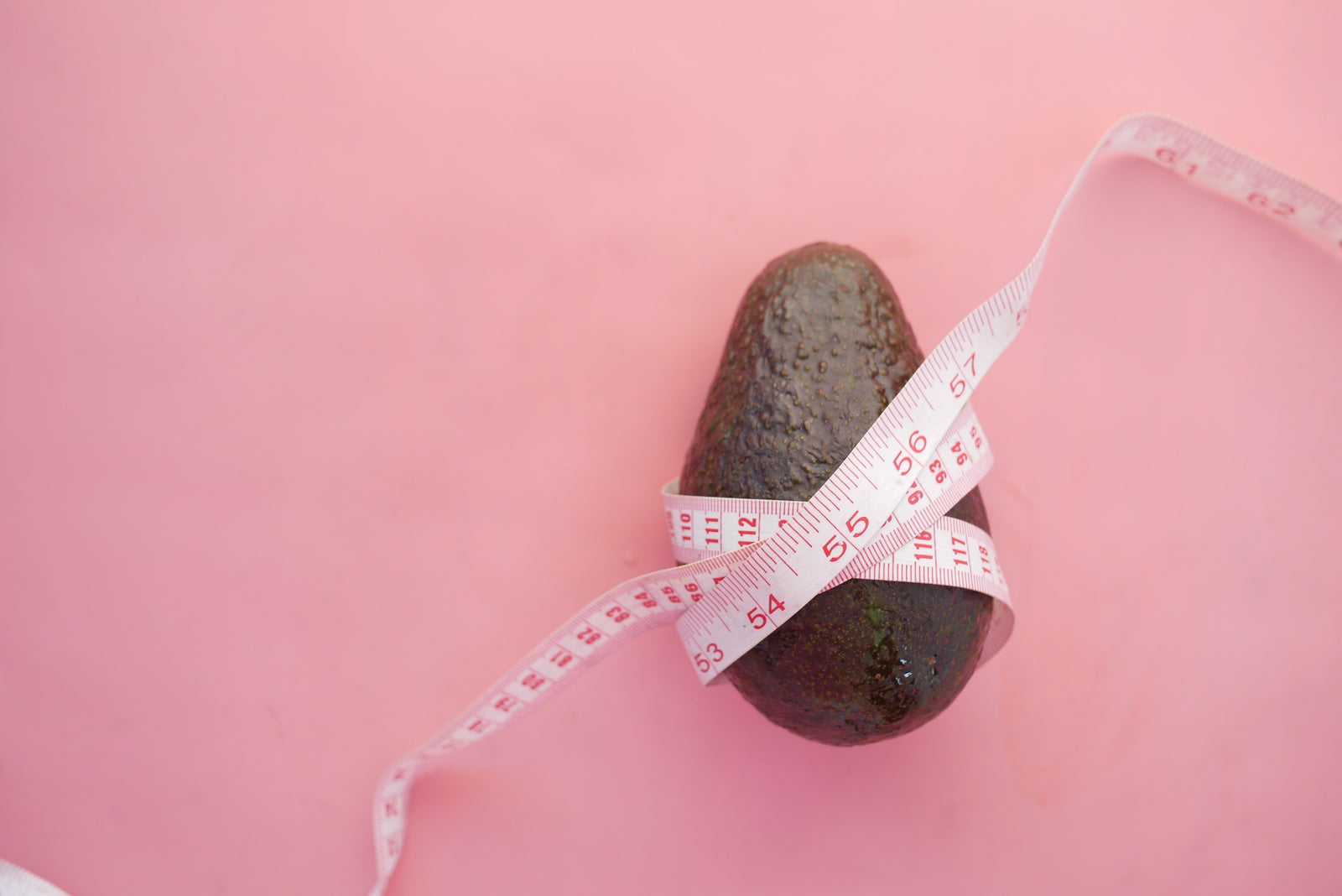 avocado with tape measure