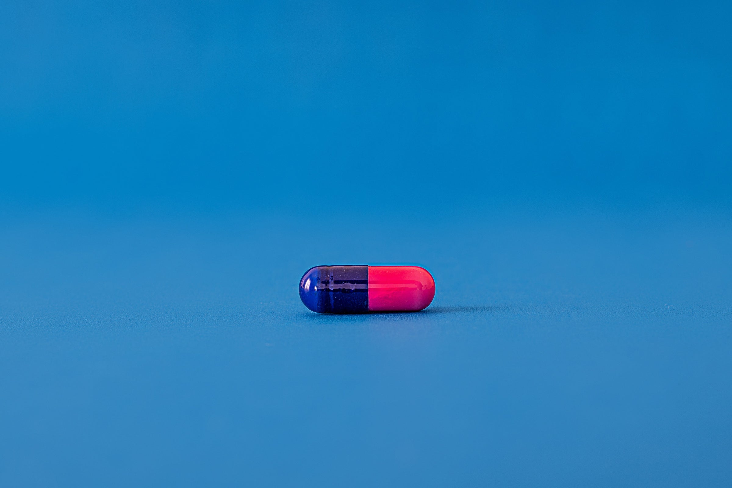 Capsule with blue background