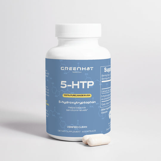 A bottle of GreenHat 5-HTP - Double Pack supplement with 60 capsules to help balance serotonin levels for mood elevation. Two capsules are placed in front of the bottle.