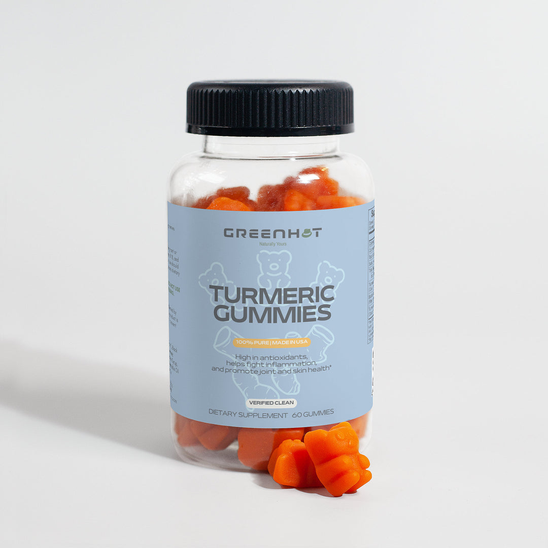 A bottle of GreenHat Turmeric Gummies - Immunity Accelerator with orange gummy bears next to it. The label highlights curcumin, antioxidants, anti-inflammatory properties, and digestive and skin health benefits. Contains 60 gummies.