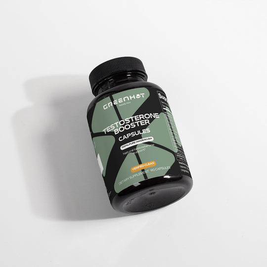 A bottle of GreenHat Testosterone Booster - Get The Most Out Of Yourself, enriched with Tribulus Terrestris and containing 120 dietary supplement capsules, on a white background.