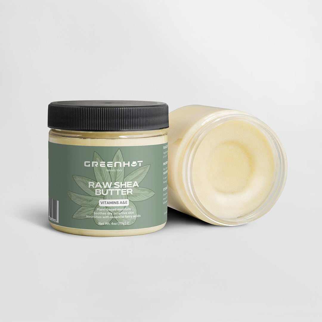 Two jars of GreenHat Raw Shea Butter are displayed, one upright and one lying on its side, against a plain white background. This plant-based moisturizer showcases the unrefined goodness essential for nourishing your skin naturally.