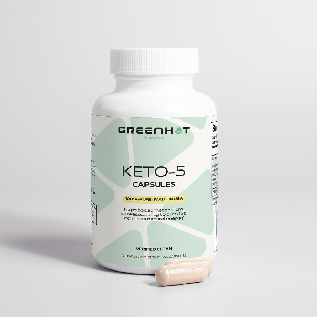 A bottle labeled "GreenHat Keto-5 - Unlimited Energy Capsules" with a single capsule next to it. The label mentions boosting metabolism, burning fat, and increasing energy while providing essential keto support. Contains 60 capsules, made in the USA.