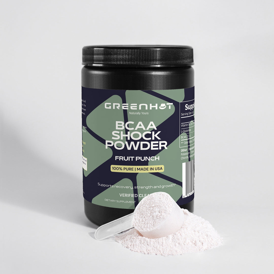 A jar of GreenHat BCAA Shock Powder (Fruit Punch) supplement, designed for muscle recovery, with a white scoop of powder in front.