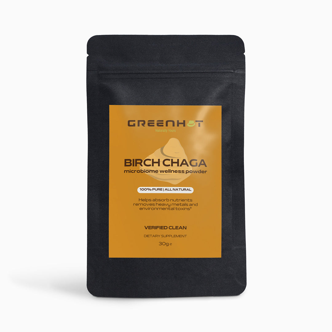 A black resealable pouch labeled "GreenHat Birch Chaga Microbiome Wellness Powder," 30g. The label mentions the product is 100% pure, natural, and rich in phytochemicals to boost the immune system while helping absorb nutrients and remove toxins.