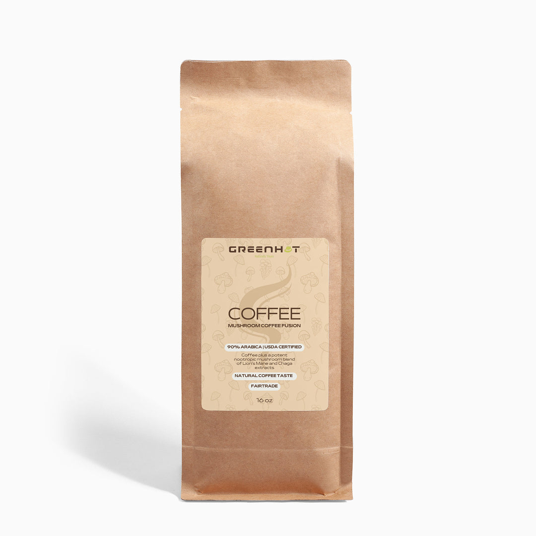 A 16 oz brown paper bag of GreenHat Mushroom Coffee Fusion - Lion’s Mane & Chaga featuring a label indicating 100% Arabica, USDA certified organic beans with natural coffee taste and enhanced with Mushroom Coffee Fusion for cognitive function and immune support.