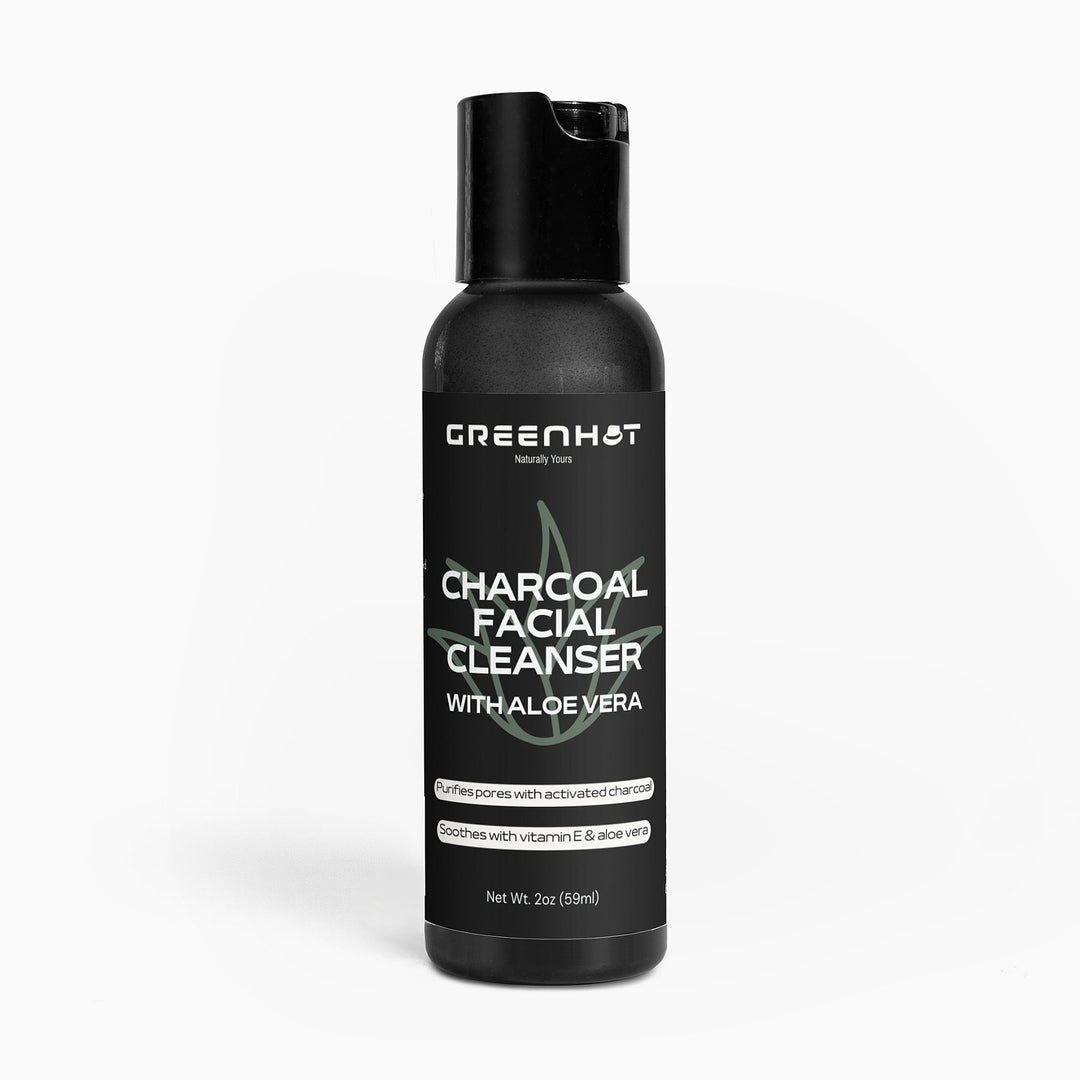 A 2 oz bottle of GreenHat Charcoal Facial Cleanser with Aloe Vera. This daily use cleanser purifies pores with activated charcoal and soothes with natural ingredients like vitamin E and aloe vera.