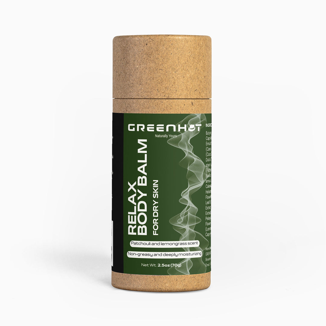 A cylindrical container of GreenHat Relax Body Balm with a green label. It is designed for dry skin and offers aromatherapy benefits with scents of patchouli and lemongrass. The brown container has a natural, eco-friendly look.