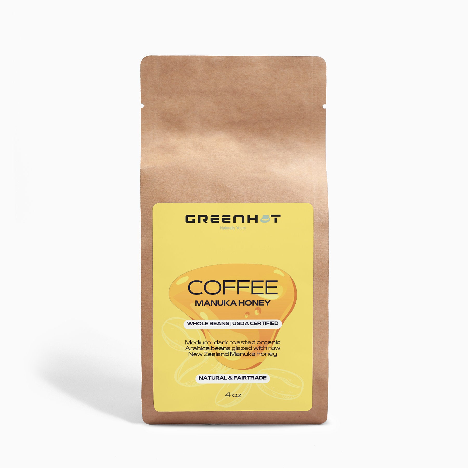 A brown paper bag labeled "Manuka Honey Coffee 4oz - Awaken Your Senses" from GreenHat containing medium-dark roasted organic Arabica beans blended with New Zealand Manuka honey.