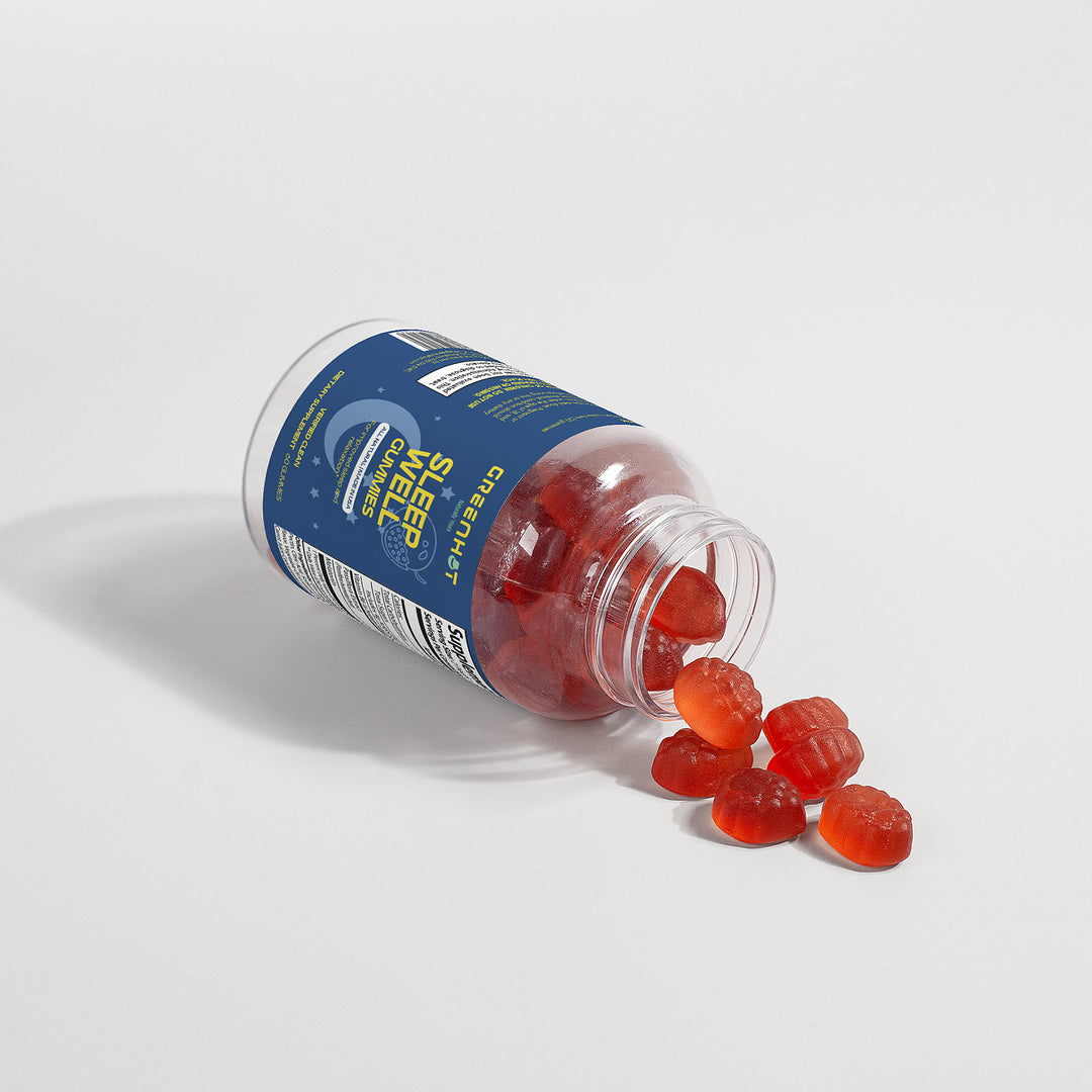 A bottle labeled "GreenHat Sleep Well Gummies (Adult)" lies on its side with red gummies spilling out on a white surface, promising restful nights as a natural sleep aid.