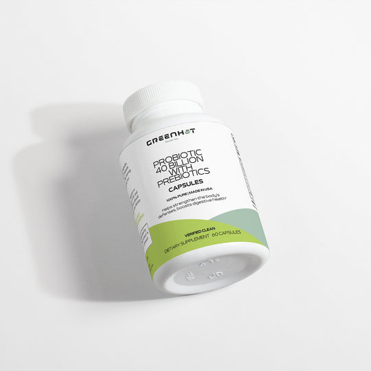 Bottle of GreenHat Probiotic 40 Billion with Prebiotics capsules lying on a white surface.