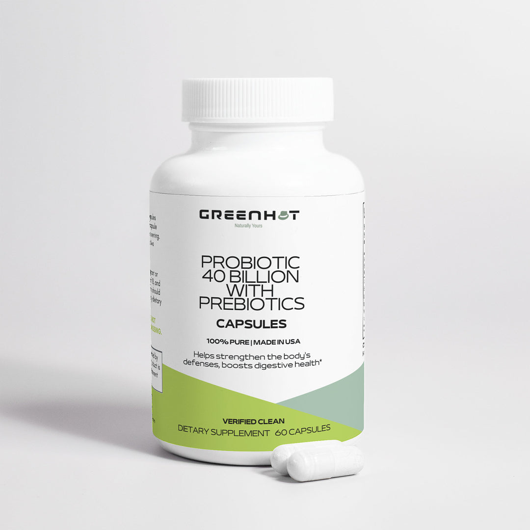 A bottle of GreenHat Probiotic 40 Billion with Prebiotics dietary supplement capsules labeled "40 billion cfu" with a white and green label on a neutral background. Two capsules lie in front of the bottle.