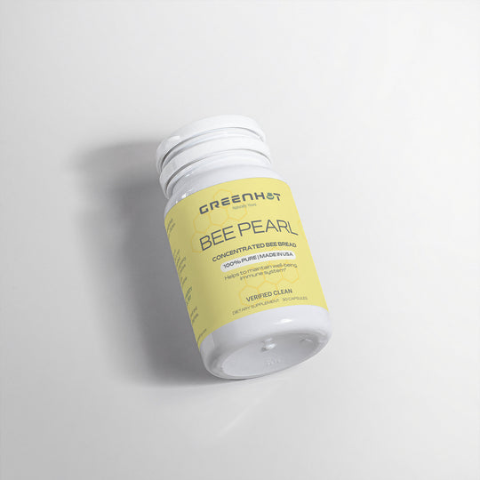 A bottle of GreenHat "Bee Pearl - Nature's Nutrient-Rich Superfood" dietary supplements on a light background, labeled as concentrated bee bread with additional plant-based ingredients for holistic health.