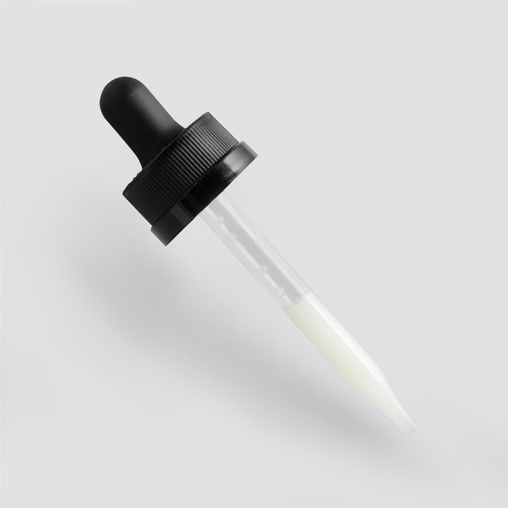 A GreenHat Vitamin C Serum - Hydration and Skin Tone Enhancement glass dropper with a black rubber top isolated on a plain white background.