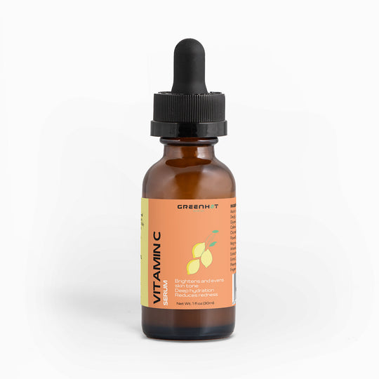 A bottle of GreenHat Vitamin C Serum - Hydration and Skin Tone Enhancement with a dropper cap, labeled for brightening and hydrating skin, on a white background.
