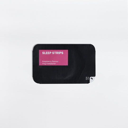 A black package labeled "GreenHat Sleep Strips" in bold white text, with a raspberry flavor and 1mg melatonin, designed for insomnia relief, displayed on a white background.