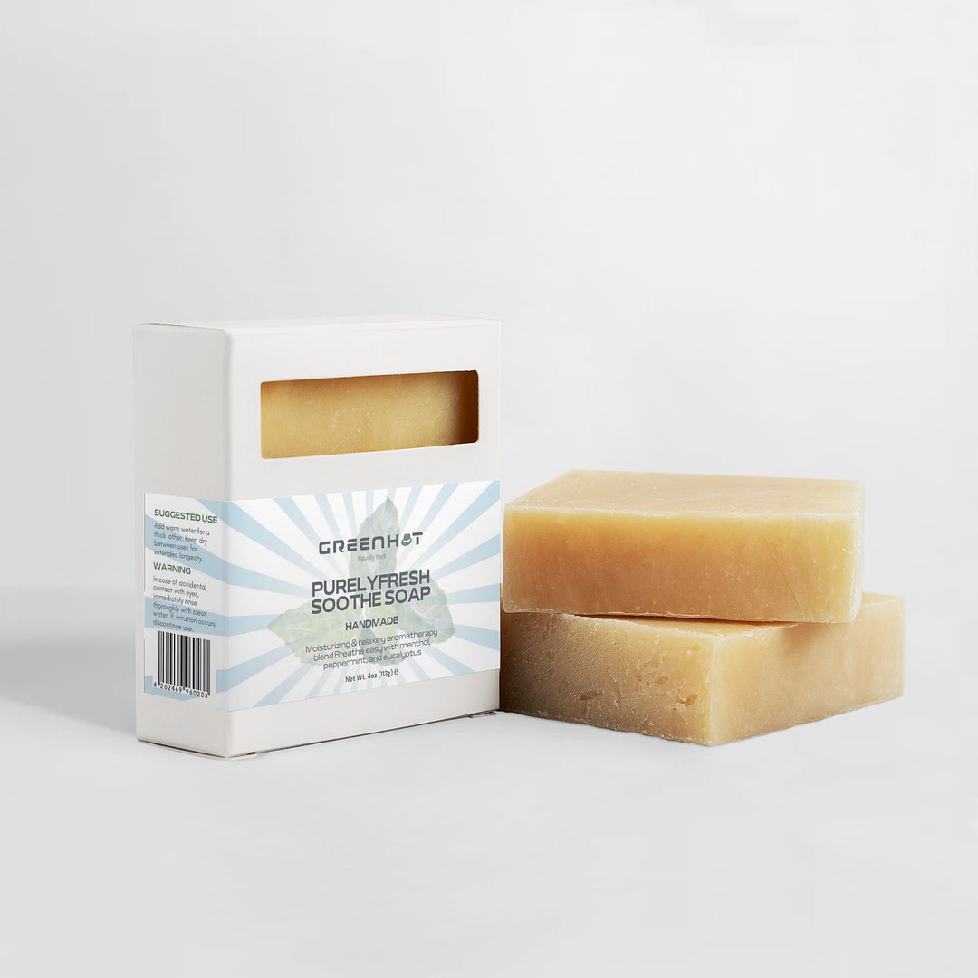 Box of GreenHat PurelyFresh Soothe Soap with two bars displayed beside it, against a white background.