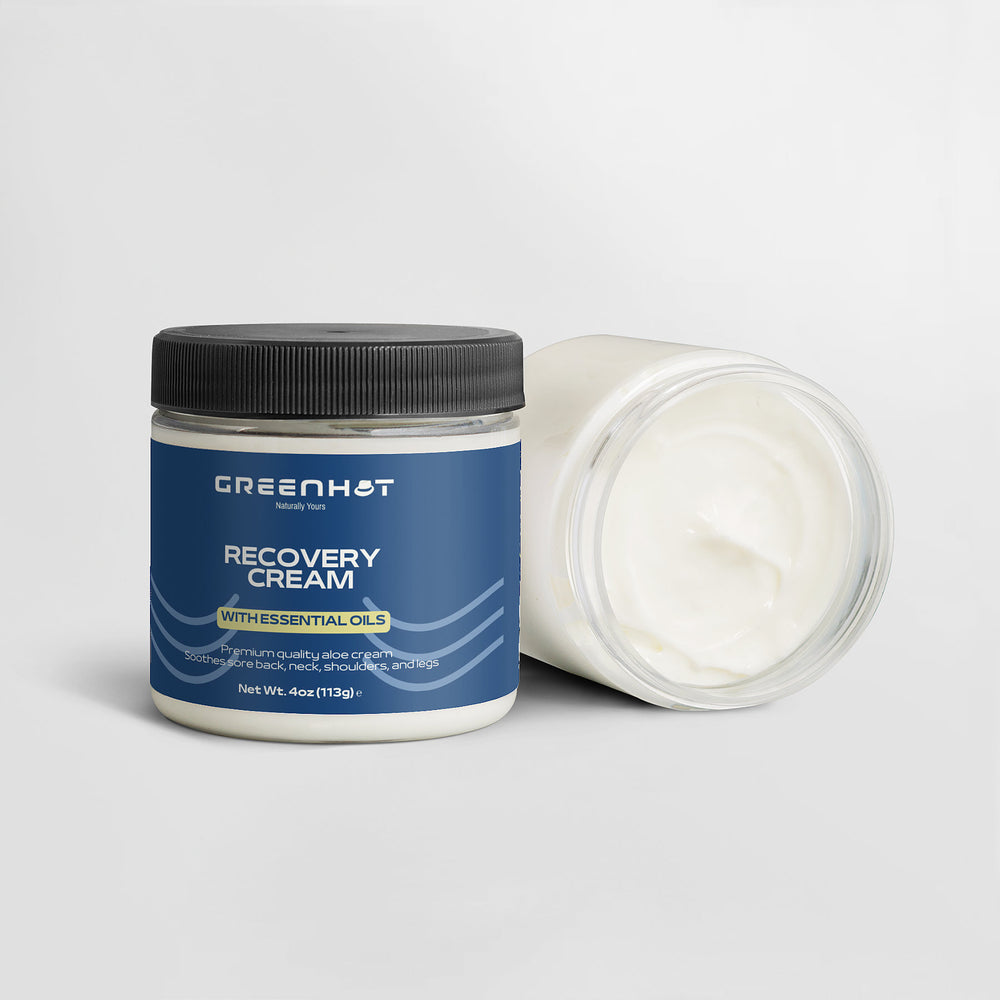 Two jars of premium GreenHat Recovery Cream, one closed and one open showing white cream, against a white background.