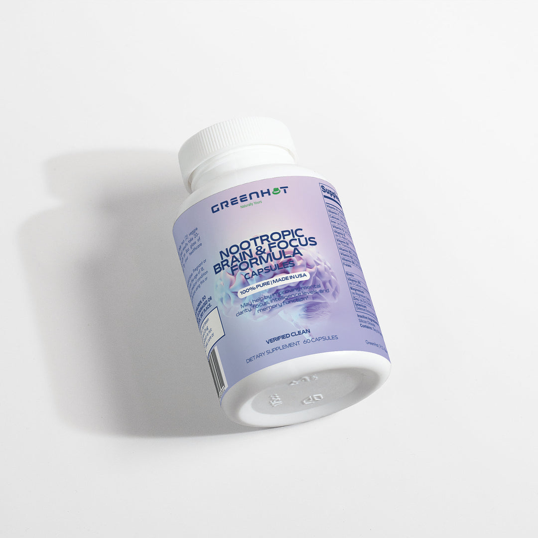 A white bottle of GreenHat Nootropic Brain & Focus Formula capsules laid horizontally on a white background, designed to enhance cognitive function.